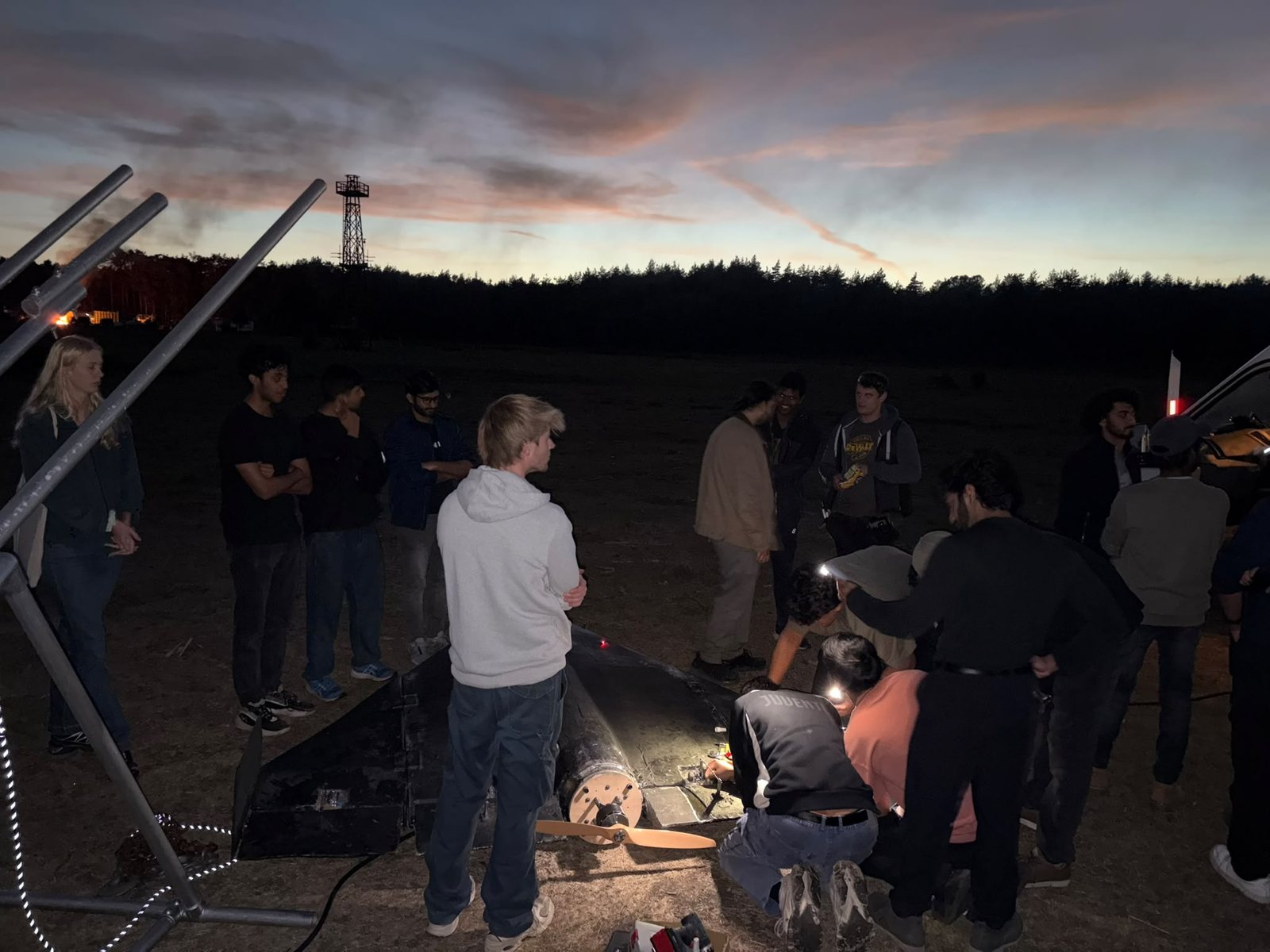 The team preparing an ICARUS airframe on the range at dusk